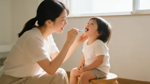 政策と家庭の「二輪駆動」:子どもの口腔健康を真に守る方法